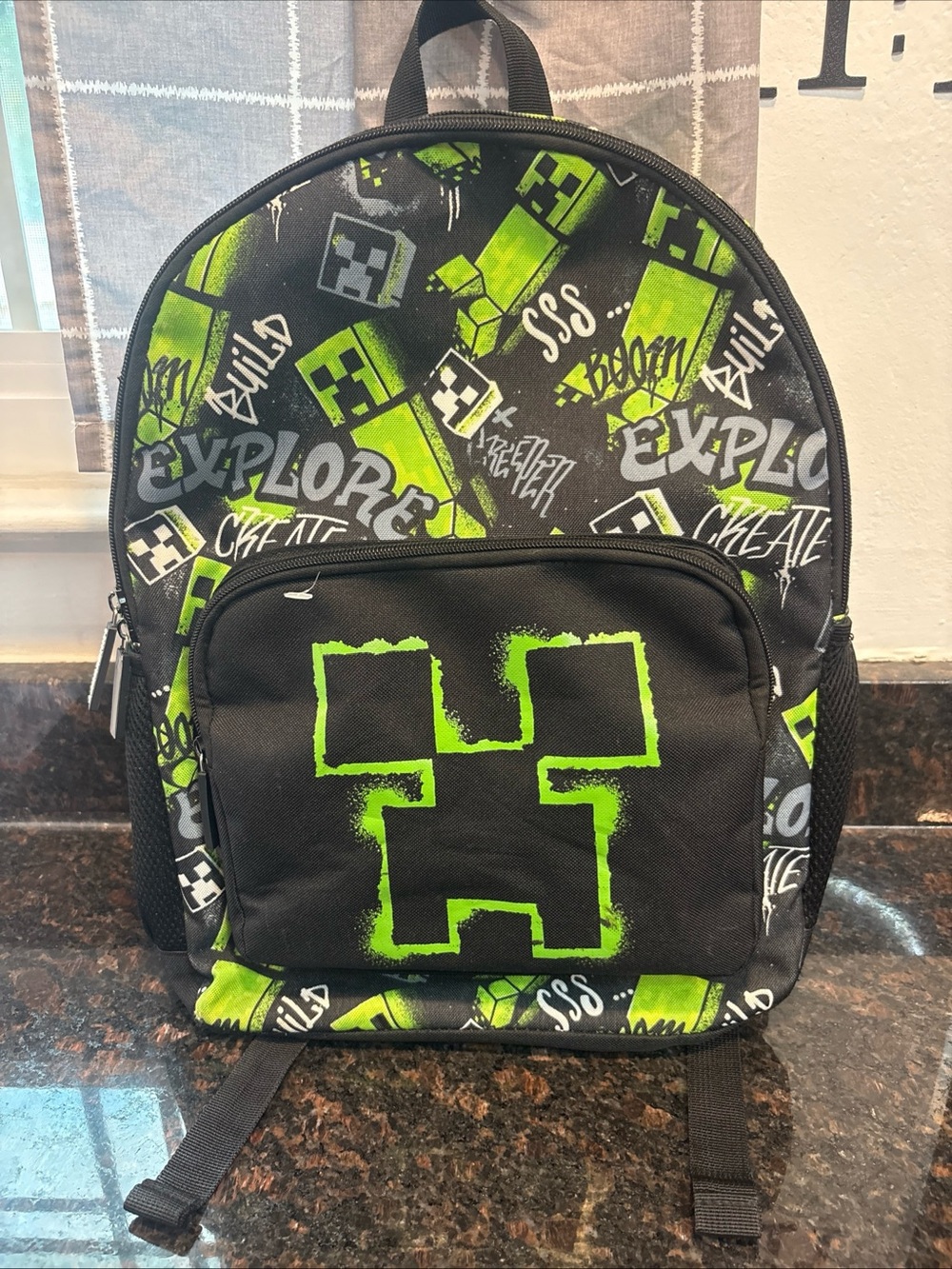 Kids Black Backpack with Neon Green Graphic Creeper Design